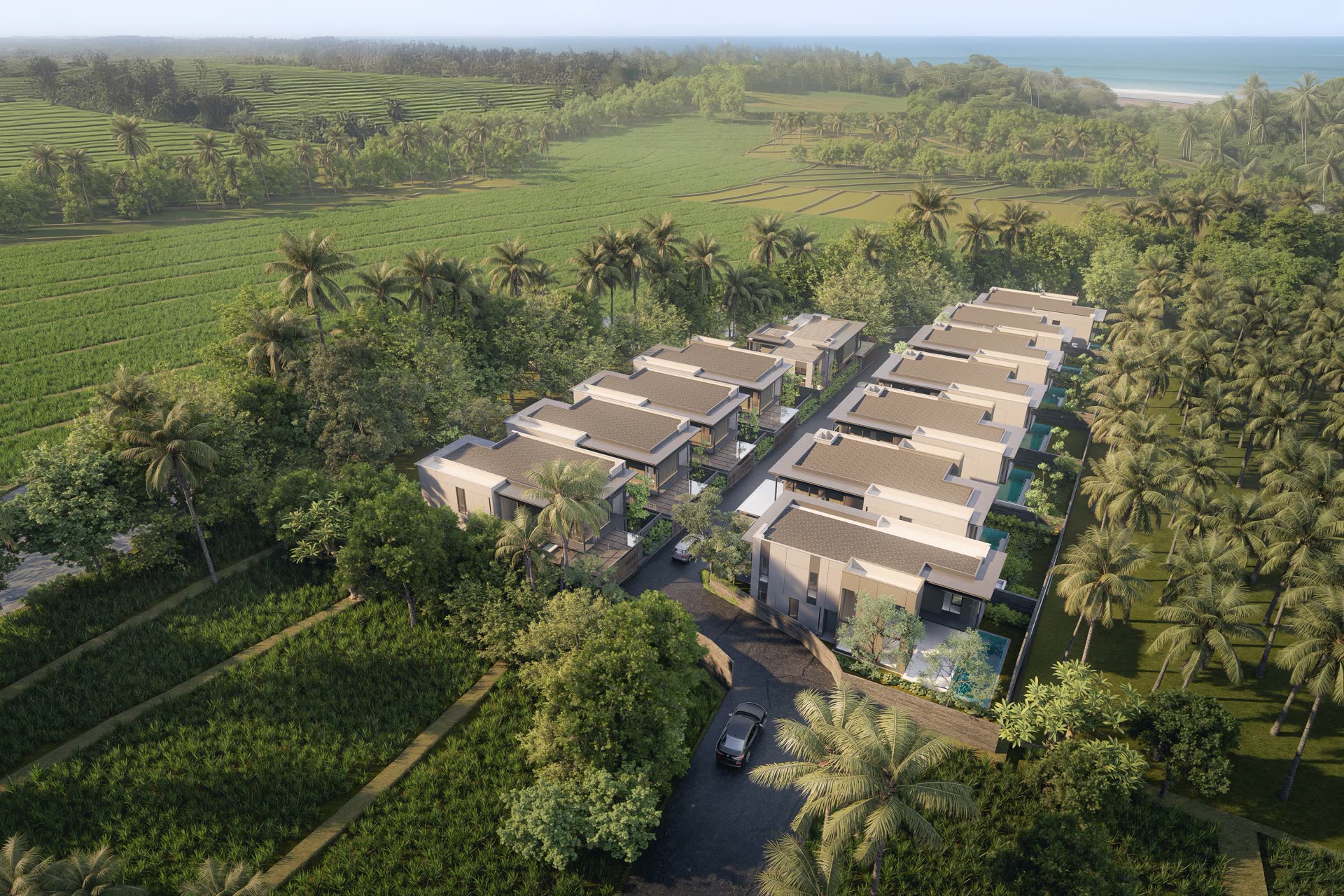Aerial rendering of Azura Living Bali villas surrounded by rice fields near the coast